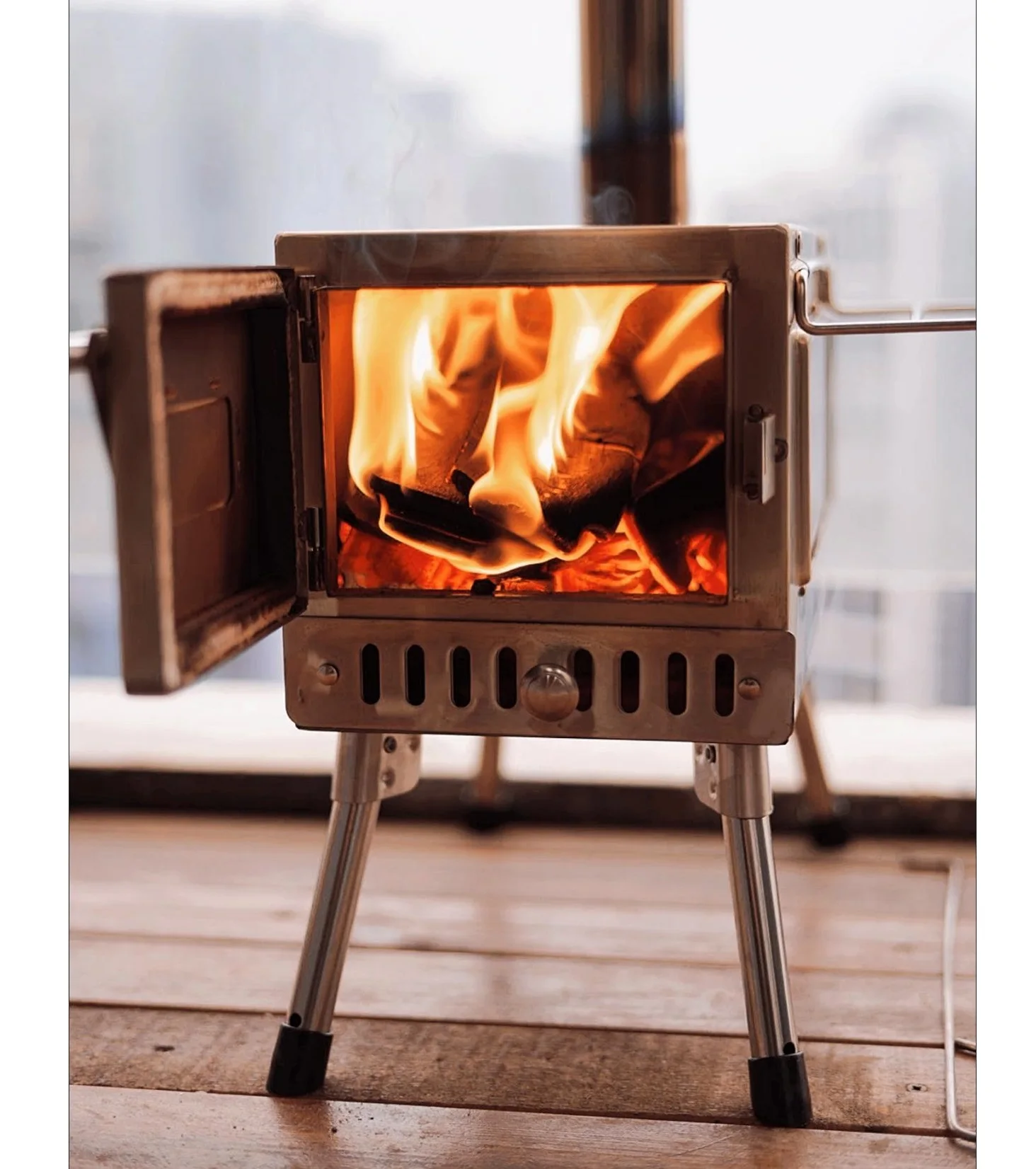Portable Outdoor Cook Heat Warm Firewood Burning Wood Stoves Titanium Tent Stove
Portable Outdoor Cook Heat Warm Firewood Burning Wood Stoves Titanium Tent Stove