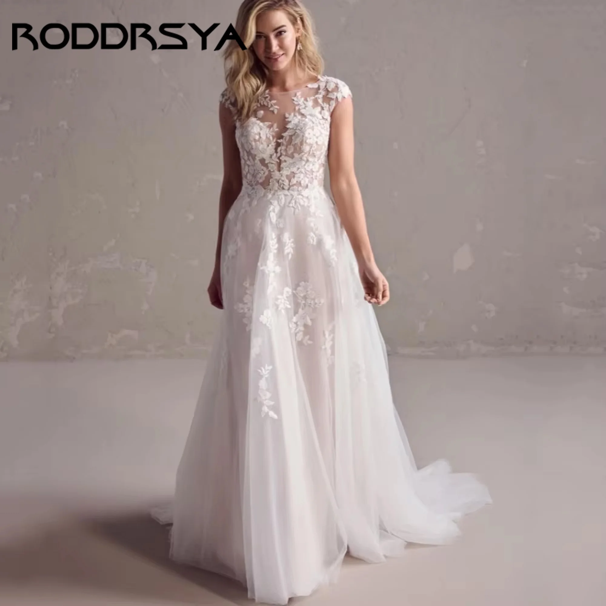 RODDRSYA Luxury A Line Wedding Dresses Lace Appliques Bride Dress Illusion Cap Sleeve Button Bridal Gown New Vestidos Customized
RODDRSYA Luxury A Line Wedding Dresses Lace Appliques Bride Dress Illusion Cap Sleeve Button Bridal Gown New Vestidos Customized