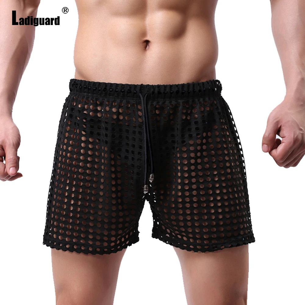 Ladiguard Sexy Men Hollow Out Shorts 2022 European Style Casual Beach Short Pants Solid Black Grey Loose Drawstring Half Pants
Ladiguard Sexy Men Hollow Out Shorts 2022 European Style Casual Beach Short Pants Solid Black Grey Loose Drawstring Half Pants