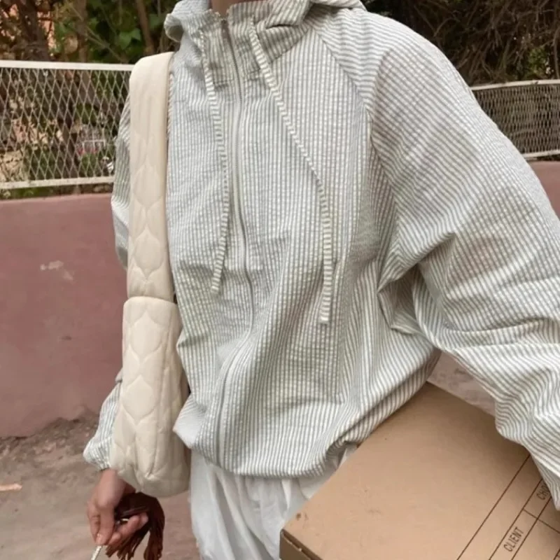 Women's Hooded Sun Protection Jacket Korean Loose Long Sleeves Retro Stripes Drawstring Zipper Open Cardigan Top Summer 2025
Women's Hooded Sun Protection Jacket Korean Loose Long Sleeves Retro Stripes Drawstring Zipper Open Cardigan Top Summer 2025