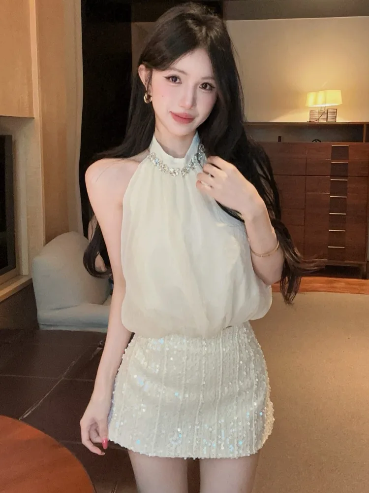 Elegant Heavy-Detail Diamond-Encrusted Shoulder-Baring Neckline White Top And Sequin Skirt Set for Young Women Summer Fashion
Elegant Heavy-Detail Diamond-Encrusted Shoulder-Baring Neckline White Top And Sequin Skirt Set for Young Women Summer Fashion