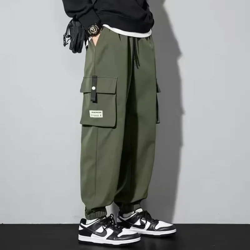 Мужские брюки-карго с накладными карманами, повседневные, свободного кроя, с эластичными манжетами и завязками, в стиле стритвир
Мужские брюки-карго с накладными карманами, повседневные, свободного кроя, с эластичными манжетами и завязками, в стиле стритвир