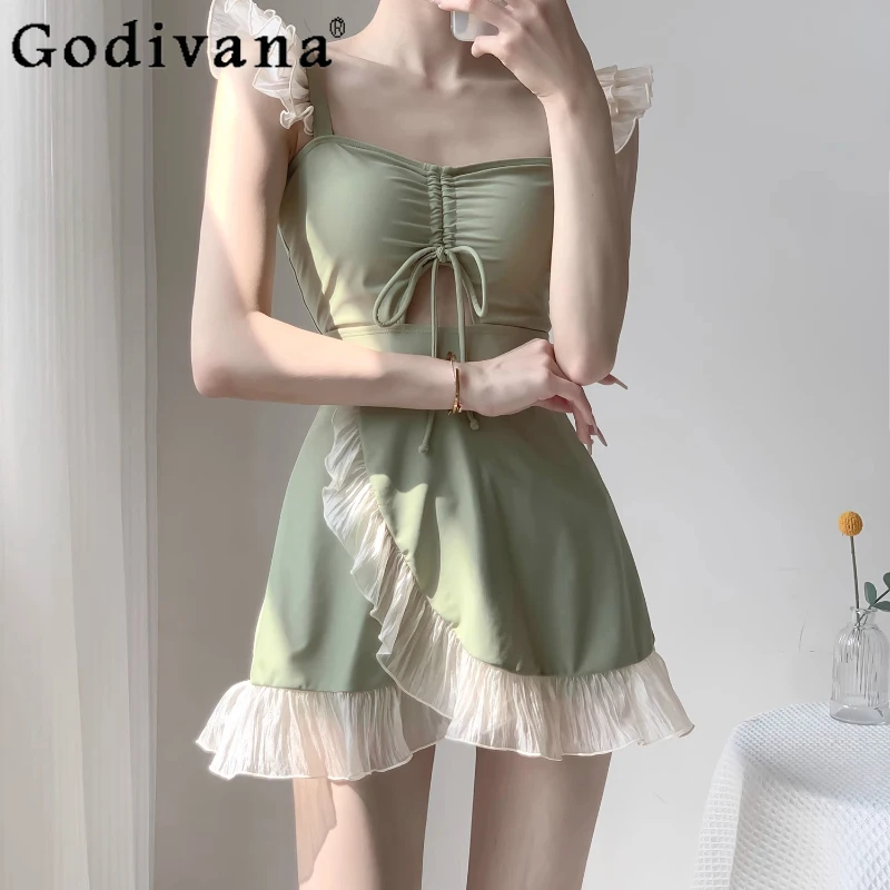Elegant French Sweet Conservative One-piece Swimsuit Girl Summer New Lace-up Ruffles Cute Square Neck Pool Suspender Swimwear
Elegant French Sweet Conservative One-piece Swimsuit Girl Summer New Lace-up Ruffles Cute Square Neck Pool Suspender Swimwear