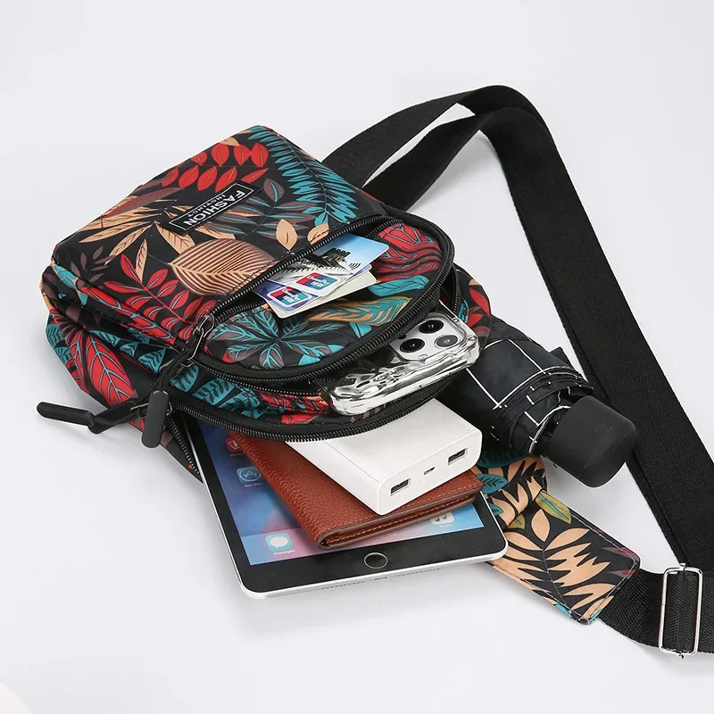 Colorful Leaf Printed Sling Crossbody Bag, Multilayer Women Chest Bag, Stylish Nylon Shoulder Bag with Adjustable Shoulder Strap
Colorful Leaf Printed Sling Crossbody Bag, Multilayer Women Chest Bag, Stylish Nylon Shoulder Bag with Adjustable Shoulder Strap