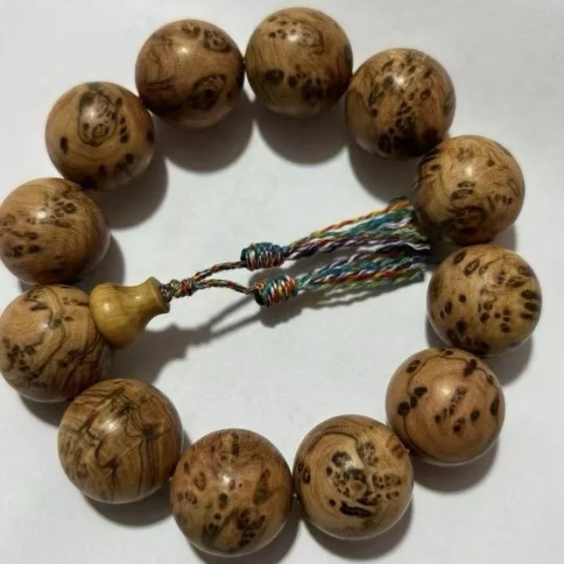 Kui Liu wood burl beads bracelet with dense bird's eye pattern, suitable for both men women, a collectible item and gift
Kui Liu wood burl beads bracelet with dense bird's eye pattern, suitable for both men women, a collectible item and gift
