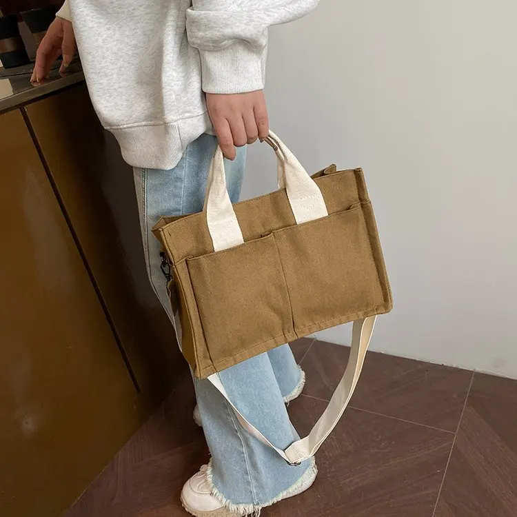 New 2025 Summer Women's Universal Canvas Tote Bag Sewing Line Shoulder Crossbody Purse Multi-Pocket for Daily/Office/Commute
New 2025 Summer Women's Universal Canvas Tote Bag Sewing Line Shoulder Crossbody Purse Multi-Pocket for Daily/Office/Commute