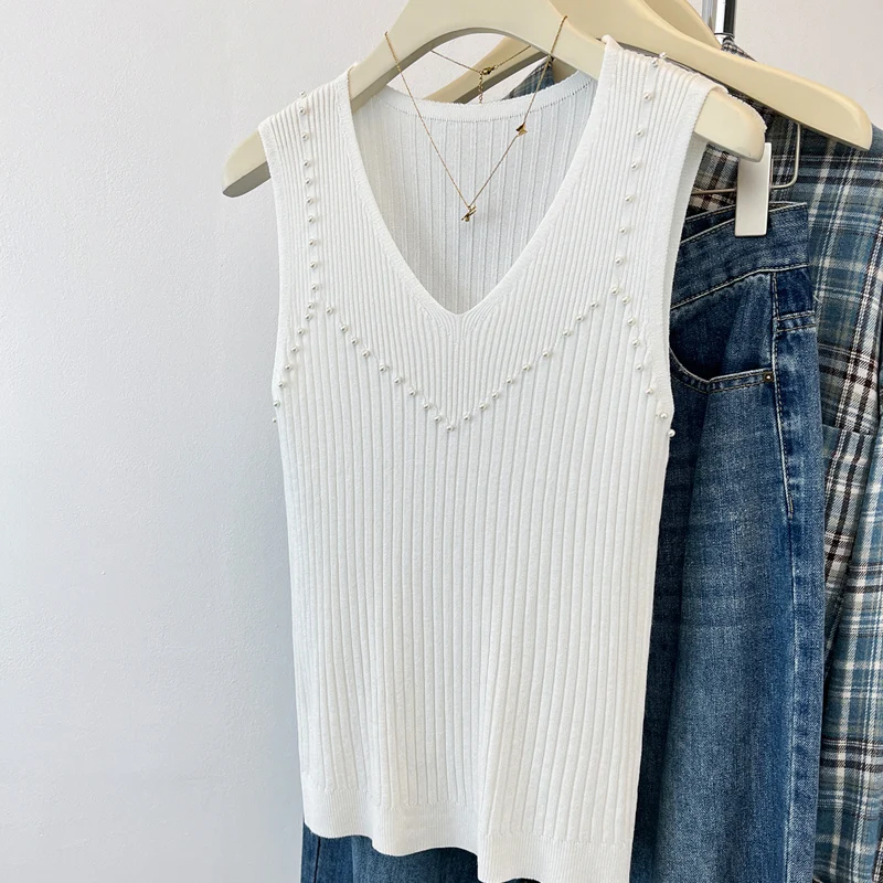 Outerwears Beading White Knitted Women Sweater New Sleeveless V-Neck Vest Knit Sweater Vest Women Tops Sueter Feminino Q2244
Outerwears Beading White Knitted Women Sweater New Sleeveless V-Neck Vest Knit Sweater Vest Women Tops Sueter Feminino Q2244