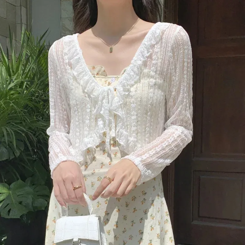 Women Loose White Sun Protection Cardigan Lace Bow Ruffle Summer Blouse Tops Y2K Korean Style Thin Cover Up Coat Female Shirt
Women Loose White Sun Protection Cardigan Lace Bow Ruffle Summer Blouse Tops Y2K Korean Style Thin Cover Up Coat Female Shirt