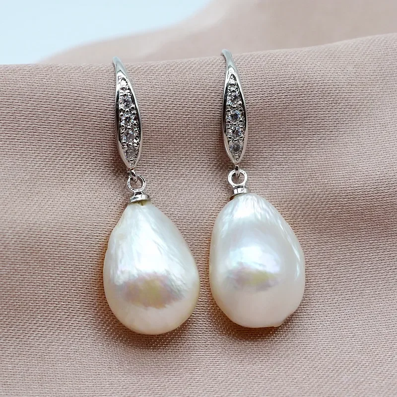 Pearl drop earrings, unique white baroque pearls, natural shape, sterling silver, women's pearl earrings
Pearl drop earrings, unique white baroque pearls, natural shape, sterling silver, women's pearl earrings