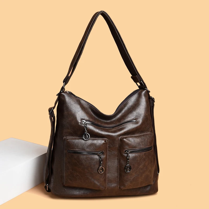 Женская сумка через плечо из искусственной кожи с несколькими карманами, большая вместимость для поездок на работу, деловых покупок, кемпинга, путешествий, тренажерного зала, сумки на плечо, рюкзак на ремне 
Женская сумка через плечо из искусственной кожи с несколькими карманами, большая вместимость для поездок на работу, деловых покупок, кемпинга, путешествий, тренажерного зала, сумки на плечо, рюкзак на ремне