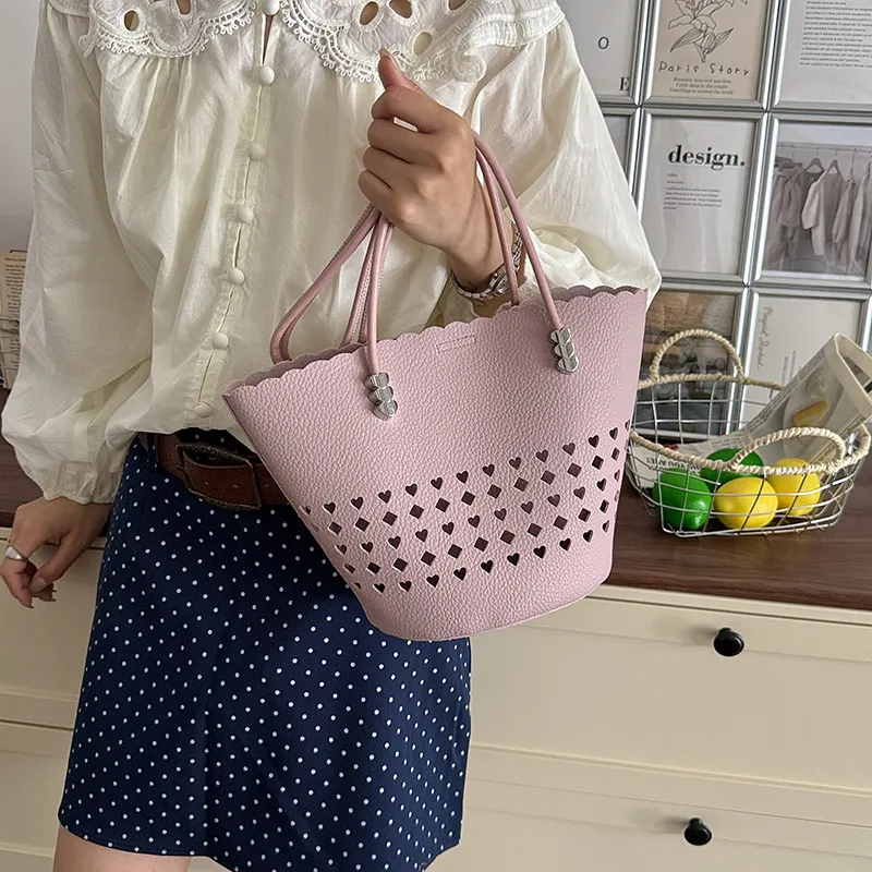 Pink Heart Hollow Out Leather Tote Bag Women Scalloped Edge Shoulder Handbag High Aesthetic Commuter Simple Crossbody Bag
Pink Heart Hollow Out Leather Tote Bag Women Scalloped Edge Shoulder Handbag High Aesthetic Commuter Simple Crossbody Bag