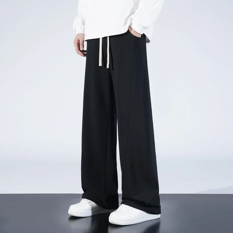 Минималистичные мужские брюки для бега из высококачественной эластичной ткани, приятные для кожи, модные, удобные, повседневные, универсальные спортивные брюки
Минималистичные мужские брюки для бега из высококачественной эластичной ткани, приятные для кожи, модные, удобные, повседневные, универсальные спортивные брюки