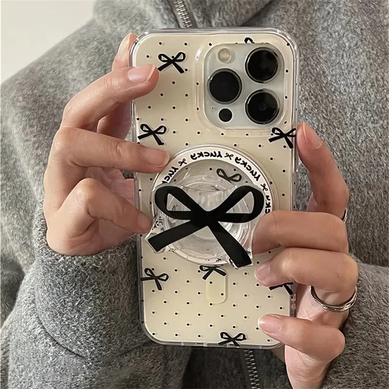 Корейская милая магнитная подставка для телефона с черным бантом Griptok Grip Tok для Magsafe для iPhone 15 14 13, складной держатель для беспроводной зарядки
Корейская милая магнитная подставка для телефона с черным бантом Griptok Grip Tok для Magsafe для iPhone 15 14 13, складной держатель для беспроводной зарядки