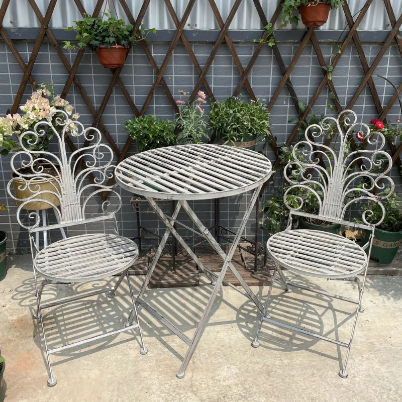 Wrought iron vintage outdoor folding utdoor patio table and chair set of three pieces garden balcony table
Wrought iron vintage outdoor folding utdoor patio table and chair set of three pieces garden balcony table