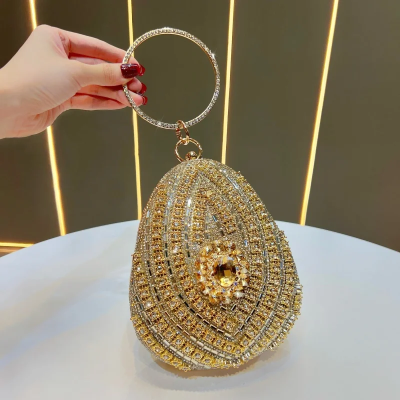 2026 New Designer Luxury Diamond Oval Bag Gold Rhinestone Evening Gown Handbag Women's Wedding Chain Shoulder Bag
2026 New Designer Luxury Diamond Oval Bag Gold Rhinestone Evening Gown Handbag Women's Wedding Chain Shoulder Bag