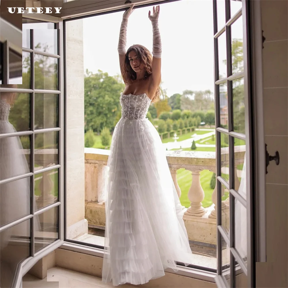 UETEEY Customized Tiered Tulle Lace Strapless A Line Wedding Dress For Women Zipper Back Floor Length Bridal vestidos de novia
UETEEY Customized Tiered Tulle Lace Strapless A Line Wedding Dress For Women Zipper Back Floor Length Bridal vestidos de novia