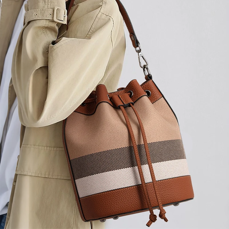 Aidrani Women's Canvas Color-Blocked Plaid Bucket Bag, New 2026 Design, Shoulder & Crossbody Bag, Top Handle Tote Bag for Mothers
Aidrani Women's Canvas Color-Blocked Plaid Bucket Bag, New 2026 Design, Shoulder & Crossbody Bag, Top Handle Tote Bag for Mothers
