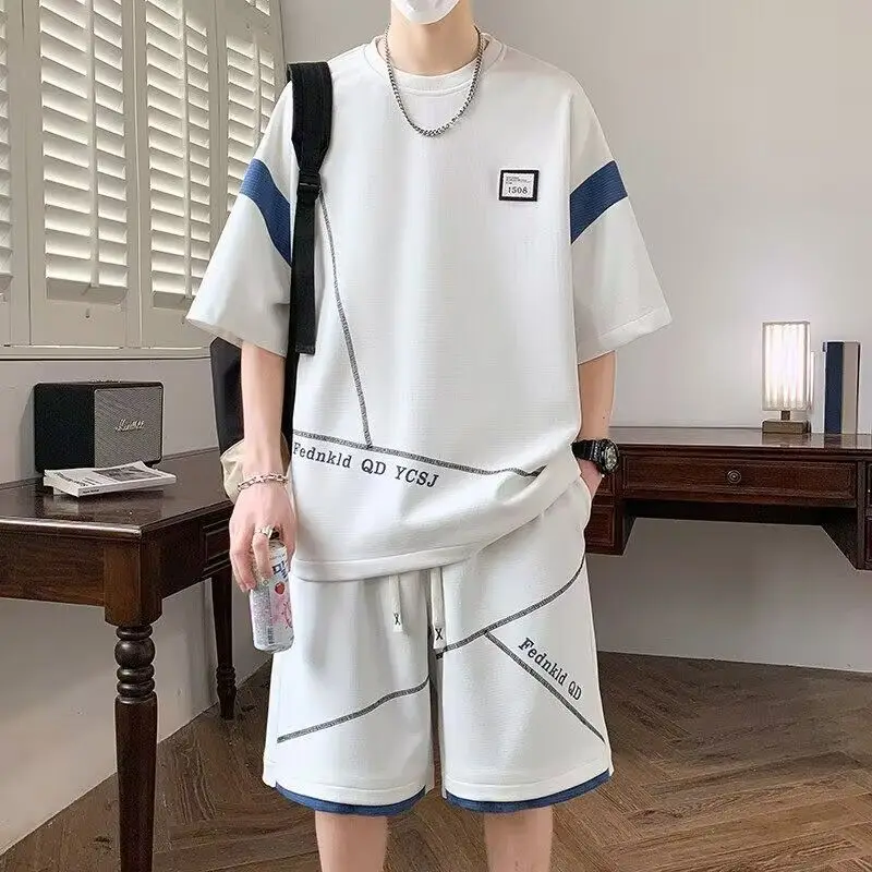 Men's Summer Sports Tracksuit Set Casual Loose Fit 2 Piece Outfit Short Sleeve T-Shirt Shorts Streetwear
Men's Summer Sports Tracksuit Set Casual Loose Fit 2 Piece Outfit Short Sleeve T-Shirt Shorts Streetwear
