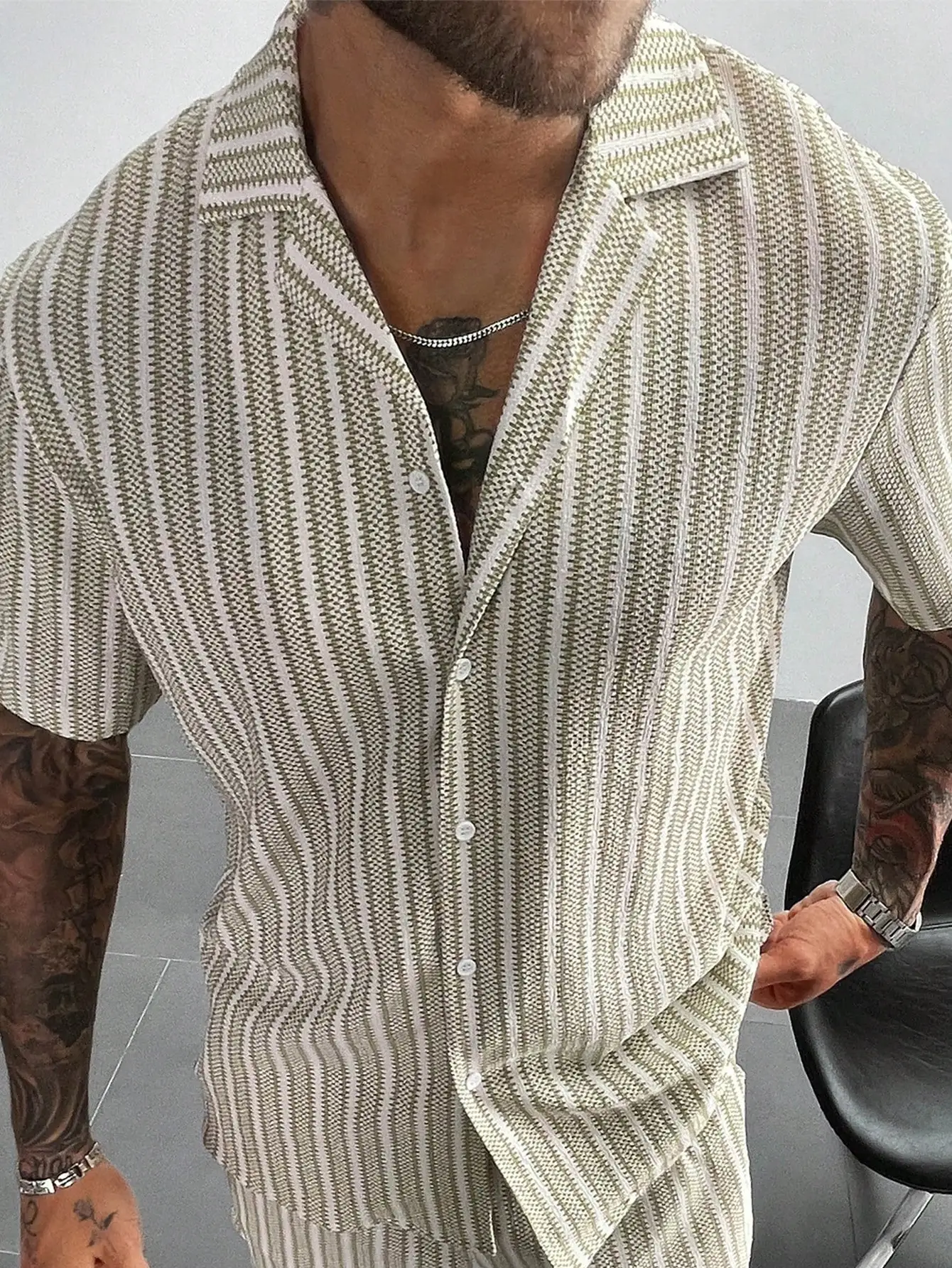 Men's Short Sleeve Casual Shirt with Vertical Striped Jacquard Knit Texture for Beach and Vacation
Men's Short Sleeve Casual Shirt with Vertical Striped Jacquard Knit Texture for Beach and Vacation