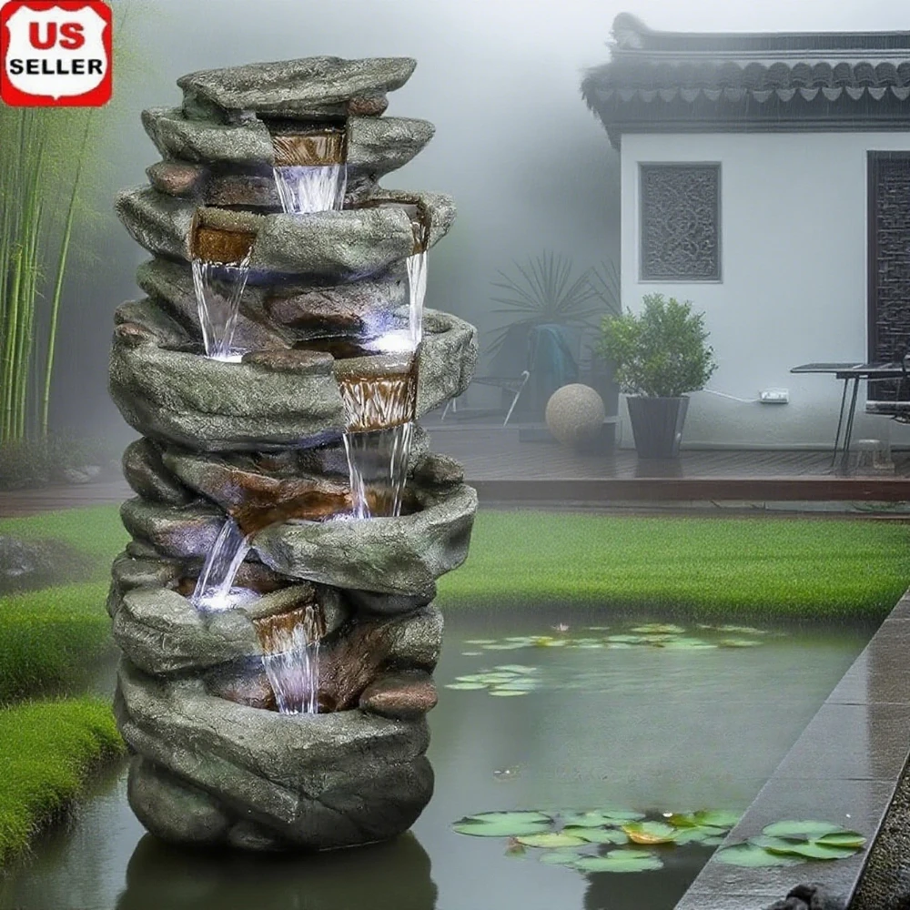 Фонтан из натурального камня 40,5 дюйма — 6-уровневый каскадный водопад со светодиодной подсветкой и успокаивающими садовыми звуками. 
Фонтан из натурального камня 40,5 дюйма — 6-уровневый каскадный водопад со светодиодной подсветкой и успокаивающими садовыми звуками.