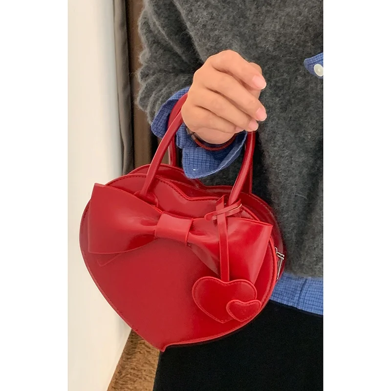 Red Faionable Sweet Knot Heart aped Handbag Women's Crossbody Bag Casual Simple Sle Soft PU Leather Handbag
Red Faionable Sweet Knot Heart aped Handbag Women's Crossbody Bag Casual Simple Sle Soft PU Leather Handbag