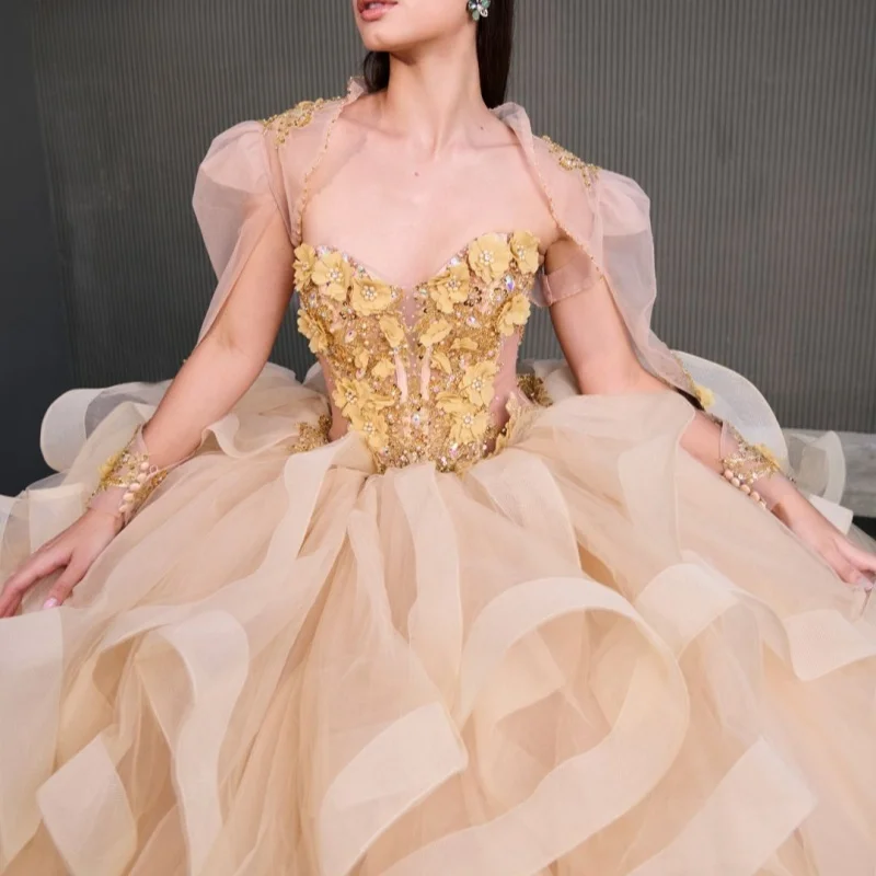 Customized champagne color Quinceanera Dresses Off the Shoulder layering applique 3D flower ruffle Vestido De 15 Quinceanera
Customized champagne color Quinceanera Dresses Off the Shoulder layering applique 3D flower ruffle Vestido De 15 Quinceanera