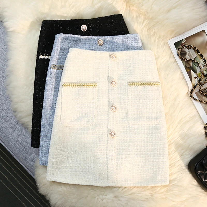 Autumn Winter Woolen Skirt Women High Waist Plaid Bright Silk Pearl Button Korean Fashion Ladies Slim Work Short Mini Skirt
Autumn Winter Woolen Skirt Women High Waist Plaid Bright Silk Pearl Button Korean Fashion Ladies Slim Work Short Mini Skirt