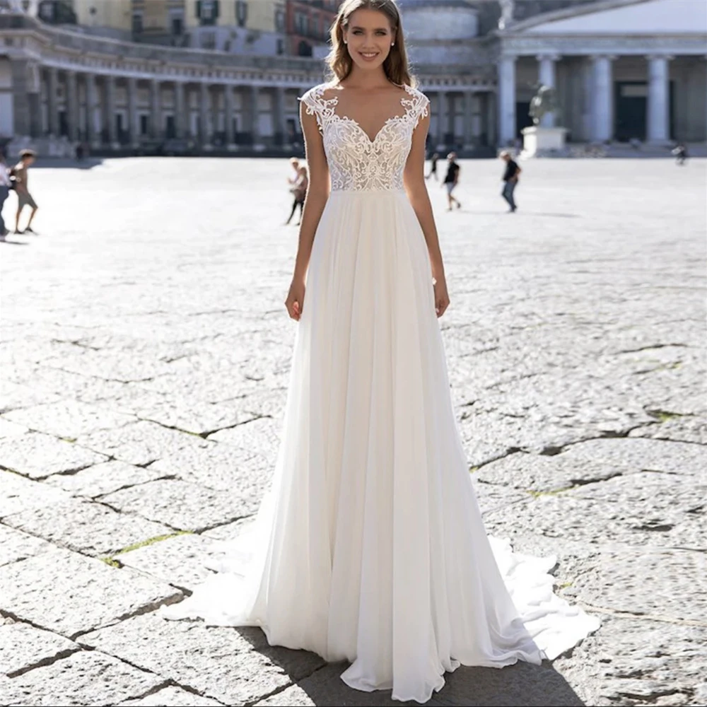 Boho A-Line V-Neck Short Sleeves Appliques Illusion Lace Chiffon Wedding Dresses 2024 Elegant vestidos de novia
Boho A-Line V-Neck Short Sleeves Appliques Illusion Lace Chiffon Wedding Dresses 2024 Elegant vestidos de novia