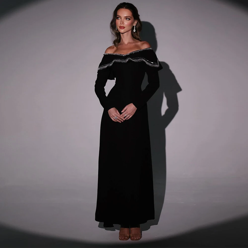 Изысканное вечернее платье в Саудовской Аравии. Классическое платье для выпускного вечера с вырезом лодочкой и длинными рукавами с открытыми плечами. Черное вечернее платье из джерси по индивидуальному заказу.
Изысканное вечернее платье в Саудовской Аравии. Классическое платье для выпускного вечера с вырезом лодочкой и длинными рукавами с открытыми плечами. Черное вечернее платье из джерси по индивидуальному заказу.