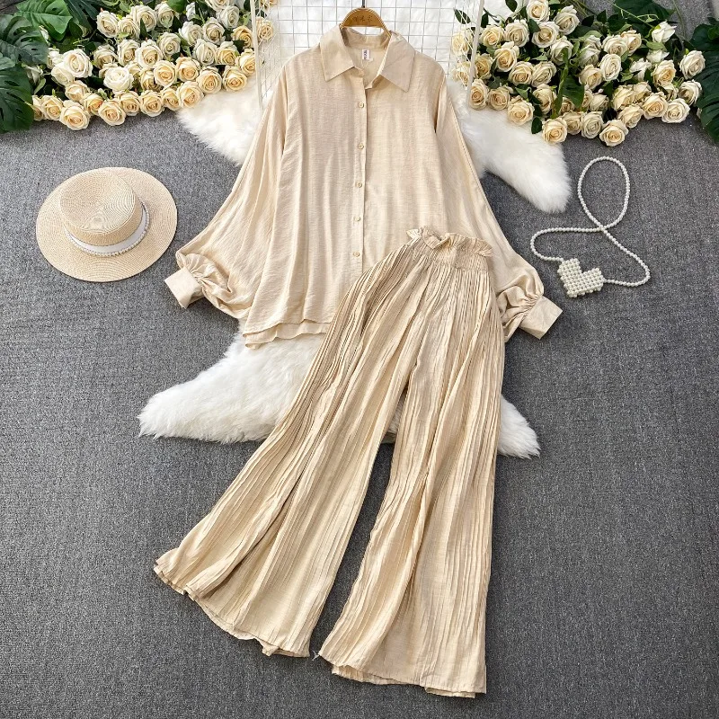 Casual loose collar Full lantern sleeve single breasted shirt+elastic high waist pleated wide leg flared pants 2-piece set Woman
Casual loose collar Full lantern sleeve single breasted shirt+elastic high waist pleated wide leg flared pants 2-piece set Woman