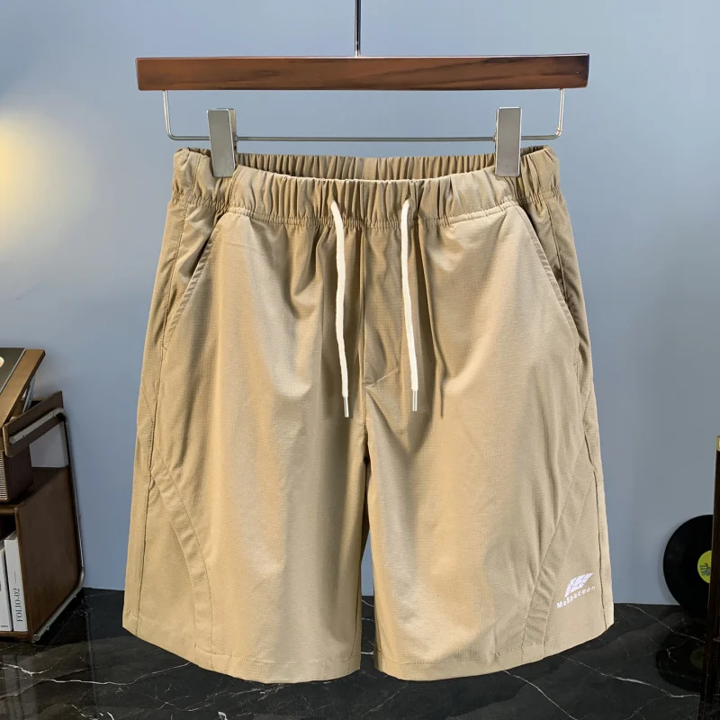 Летние дышащие шорты из ледяного шелка с тонкой эластичной резинкой на талии для мужчин, новинка 2023 года, повседневные эластичные быстросохнущие спортивные брюки пять четвертей
Летние дышащие шорты из ледяного шелка с тонкой эластичной резинкой на талии для мужчин, новинка 2023 года, повседневные эластичные быстросохнущие спортивные брюки пять четвертей