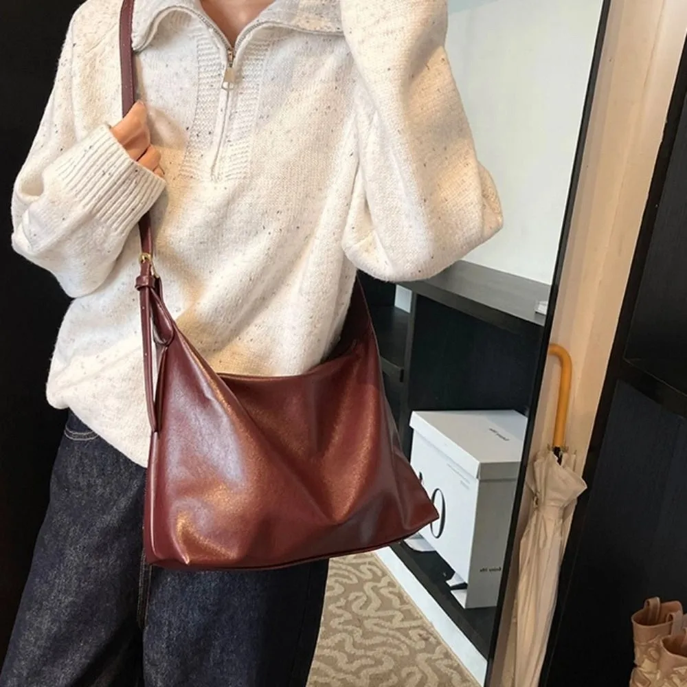 Elegant Soft Leather Tote Bag Large Capacity Zipper Commuting Shoulder Bag Lightweight Solid Color Vintage Underarm Bag Women
Elegant Soft Leather Tote Bag Large Capacity Zipper Commuting Shoulder Bag Lightweight Solid Color Vintage Underarm Bag Women