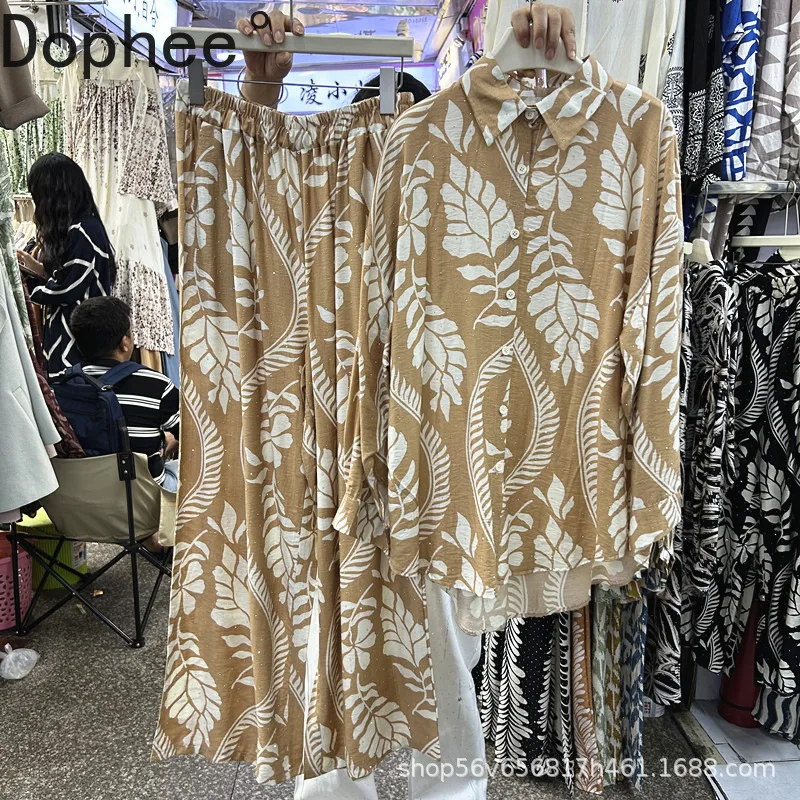 New Autumn Casual Women Two-piece Set Vintage Printed Hot Drilling Loose Long Sleeve Shirt Top + Elastic Waist Wide Leg Pants 
New Autumn Casual Women Two-piece Set Vintage Printed Hot Drilling Loose Long Sleeve Shirt Top + Elastic Waist Wide Leg Pants