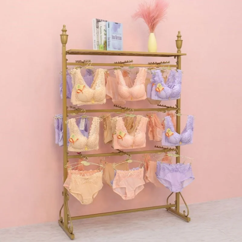 Custom, Retail Lingerie Store Gold Metal Women Bra Underwear Display Stand Hanging Rack Shop Furniture
Custom, Retail Lingerie Store Gold Metal Women Bra Underwear Display Stand Hanging Rack Shop Furniture