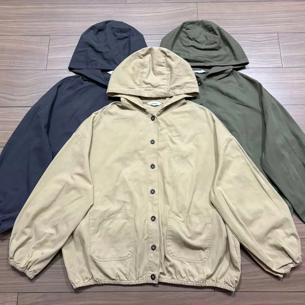 Spring 2026 Women's Pure Color Hooded Jacket Loose Fit Cotton Sweater Style Thickened Long Sleeve Button up Shirt
Spring 2026 Women's Pure Color Hooded Jacket Loose Fit Cotton Sweater Style Thickened Long Sleeve Button up Shirt