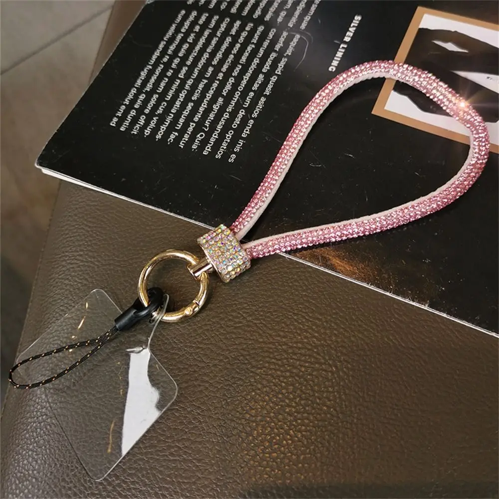Rhinestone Mobile Phone Lanyard Bling Bling Hanging Rope Phone Wrist Strap Handheld Anti Loss Diamond Lanyard Phone Pendant 
Rhinestone Mobile Phone Lanyard Bling Bling Hanging Rope Phone Wrist Strap Handheld Anti Loss Diamond Lanyard Phone Pendant