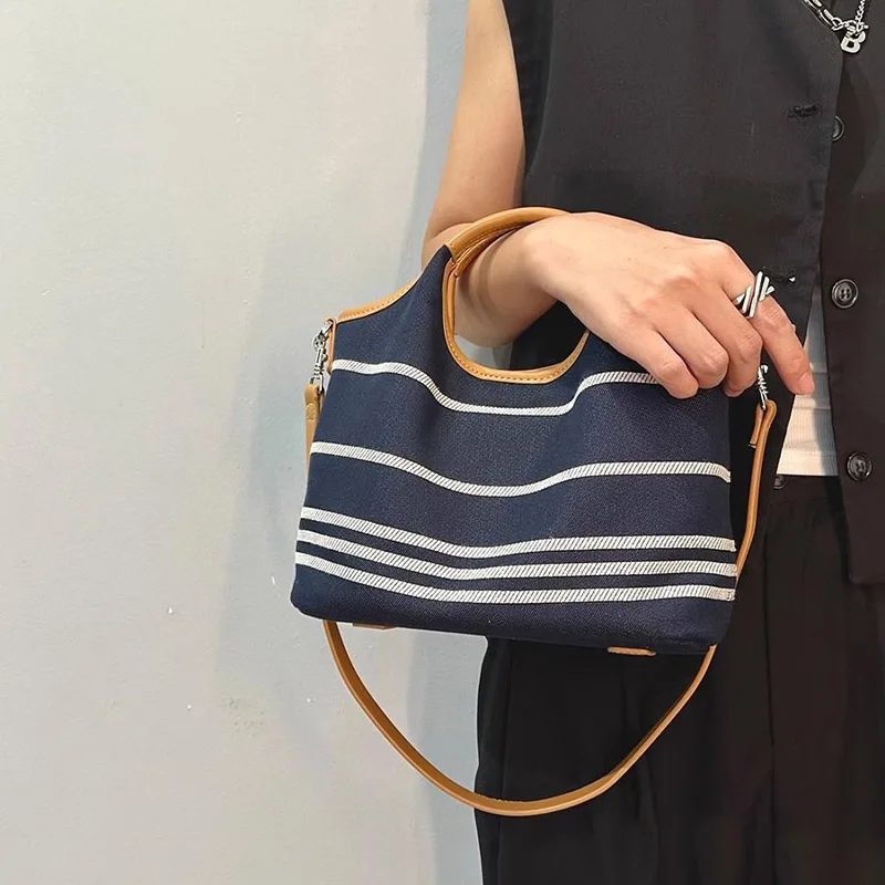 Retro large capacity denim striped handbag for women 2025 new fashion designer single shoulder underarm mother bag crossbody bag
Retro large capacity denim striped handbag for women 2025 new fashion designer single shoulder underarm mother bag crossbody bag