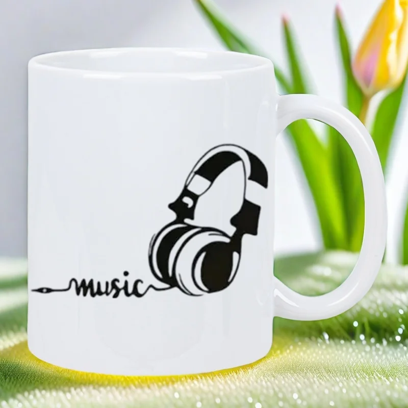 Music Lover's White Ceramic Mug with Headphones & Music Notes Design - Reusable Coffee Cup for Tea, Hot Chocolate - Hand Wash On
Music Lover's White Ceramic Mug with Headphones & Music Notes Design - Reusable Coffee Cup for Tea, Hot Chocolate - Hand Wash On