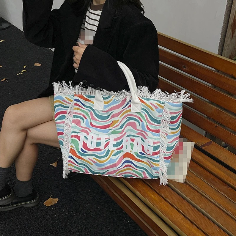 Women's Commuter Tote Bag with Large Capacity Canvas Shoulder Bag Tassel Wave Print Daily Work Travel
Women's Commuter Tote Bag with Large Capacity Canvas Shoulder Bag Tassel Wave Print Daily Work Travel