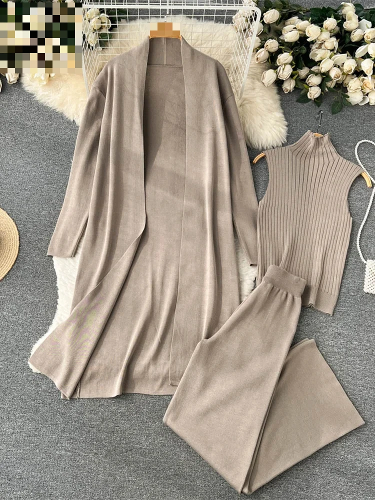 Winter Casual Knitted Three Pieces Suits Women Long Sleeve Cardigans+Turtleneck Knit Tank Top+Warm Long Pant Sets E6803
Winter Casual Knitted Three Pieces Suits Women Long Sleeve Cardigans+Turtleneck Knit Tank Top+Warm Long Pant Sets E6803