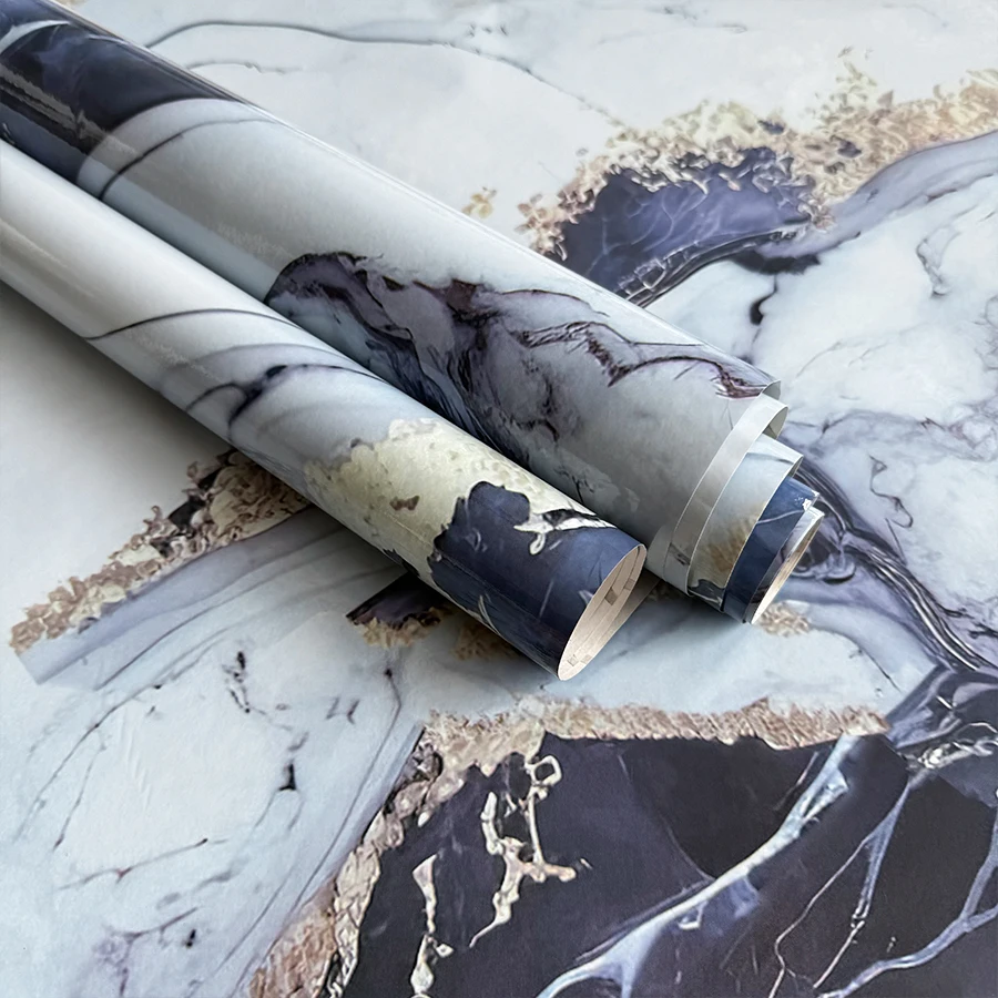 Self-adhesive gold-veined faux marble wallpaper Commonly used for wall renovation in kitchens, bathrooms, and living rooms.
Self-adhesive gold-veined faux marble wallpaper Commonly used for wall renovation in kitchens, bathrooms, and living rooms.
