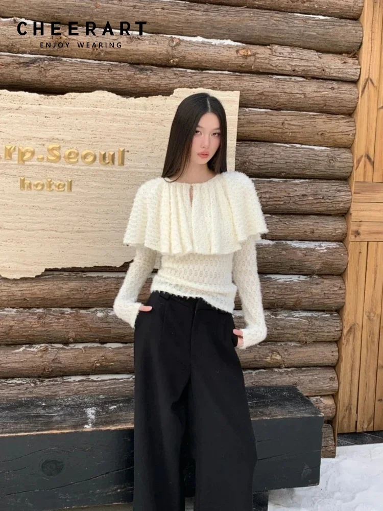 CHEERART Designer Cloak Long Sleeve Knitted Blouse Woman Luxury Beige White Fashion Top Spring 2026 Ladies Clothes
CHEERART Designer Cloak Long Sleeve Knitted Blouse Woman Luxury Beige White Fashion Top Spring 2026 Ladies Clothes