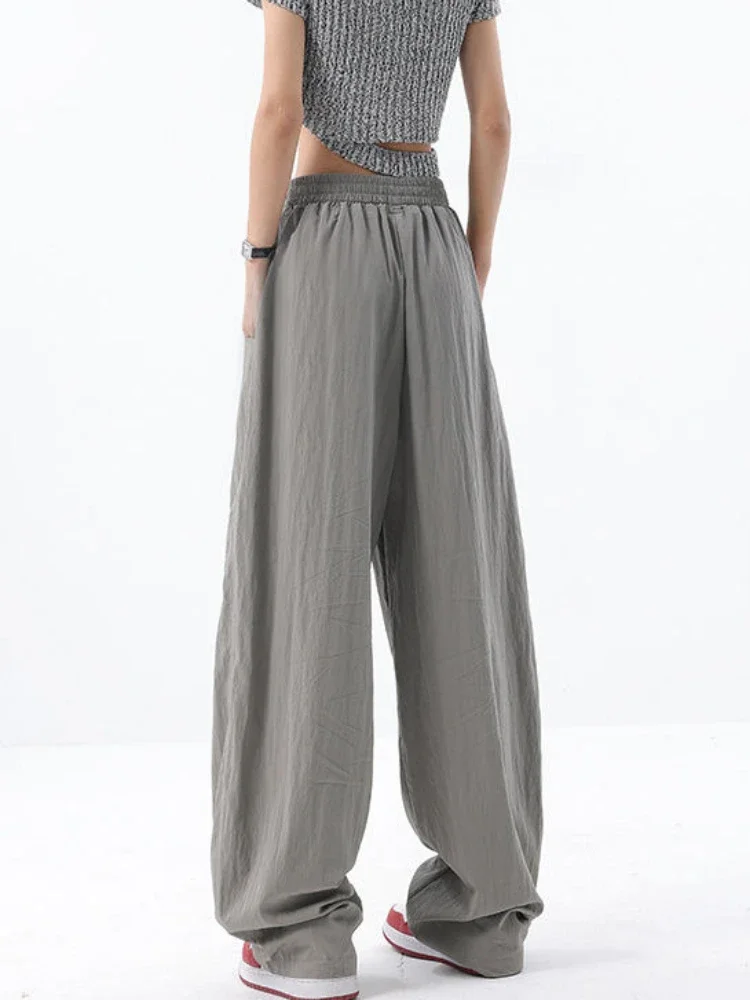 Брюки женские прямые в стиле ретро с эластичной резинкой на талии однотонные мешковатые брюки в американском стиле Y2k для отдыха летние дышащие уютные брюки для тренировок
Брюки женские прямые в стиле ретро с эластичной резинкой на талии однотонные мешковатые брюки в американском стиле Y2k для отдыха летние дышащие уютные брюки для тренировок