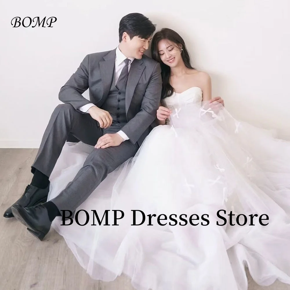 BOMP Bow Applique Wedding Dress Strapless Tiered Floor Length Bridal Gown Korea Photo Shoot Customized Elegant
BOMP Bow Applique Wedding Dress Strapless Tiered Floor Length Bridal Gown Korea Photo Shoot Customized Elegant