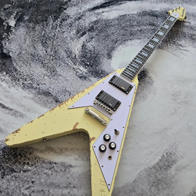 V-shaped vintage style electric guitar, high quality, rosewood fretboard, mahogany body and neck, in stock, free shipping
V-shaped vintage style electric guitar, high quality, rosewood fretboard, mahogany body and neck, in stock, free shipping