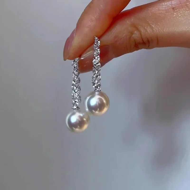 S925 Sterling Silver Geometric Pearl Pendant Zircon Tassel Stud Earrings for Women Fine Jewelry High Luxury Vintage Accessories
S925 Sterling Silver Geometric Pearl Pendant Zircon Tassel Stud Earrings for Women Fine Jewelry High Luxury Vintage Accessories