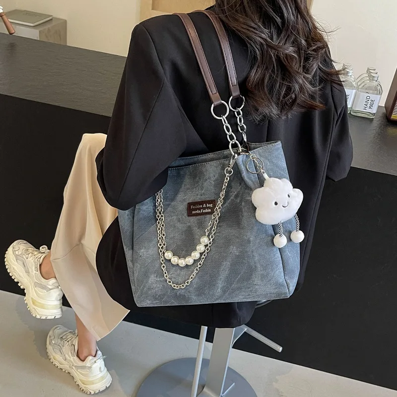 New Stylish Shoulder Bag High Quality Versatile Large Capacity Tote Bag Women Casual Minimalist Handbag Korean Popular Bags
New Stylish Shoulder Bag High Quality Versatile Large Capacity Tote Bag Women Casual Minimalist Handbag Korean Popular Bags