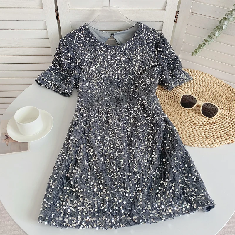 Summer New Fashion Temperament Round Neck Sequined Backless Dress Women's Design Sense Short-sleeved Waist Slimming A-line Skirt
Summer New Fashion Temperament Round Neck Sequined Backless Dress Women's Design Sense Short-sleeved Waist Slimming A-line Skirt