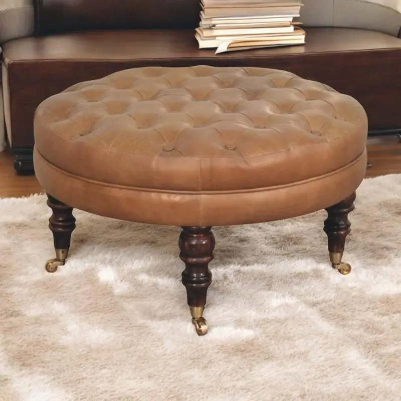 Brown Buffalo Leather Round Ottoman with Caster Legs
Brown Buffalo Leather Round Ottoman with Caster Legs