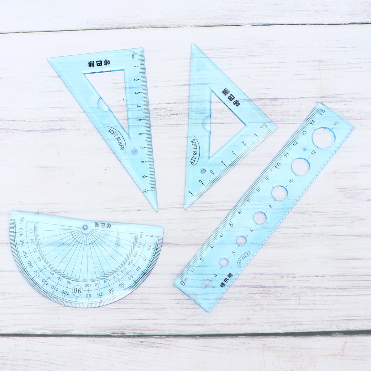 4 pcs Bendable Soft Rulers Plastic Clear Scale Triangle Student School Supplies Kid Friendly Geometry Tool Protractor
4 pcs Bendable Soft Rulers Plastic Clear Scale Triangle Student School Supplies Kid Friendly Geometry Tool Protractor